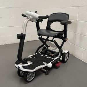 white 4 wheeled scooter with black seat