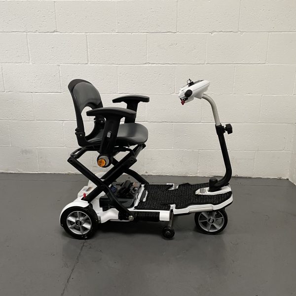 white 4 wheeled scooter with black seat side profile