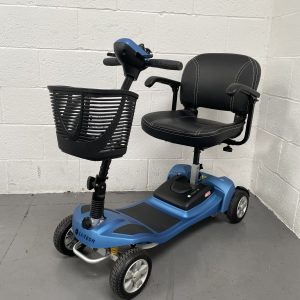 light blue and black scooter with basket