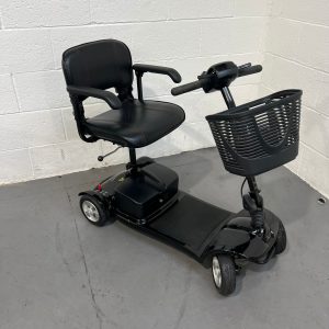 angled profile of black 4 wheeled scooter with basket